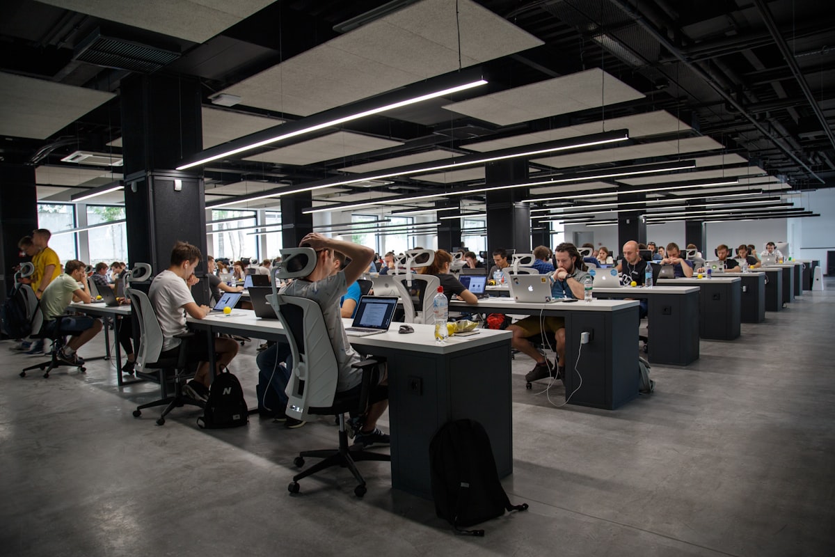 Modern office with software teams at work